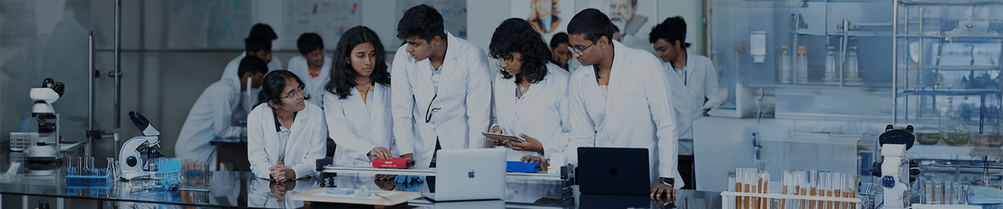 Student discussing in science lab at Ebenezer International School Bangalore